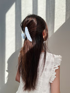 Lifestyle photo – Blue Big Dipper Hair Claw holding hair neatly in everyday style