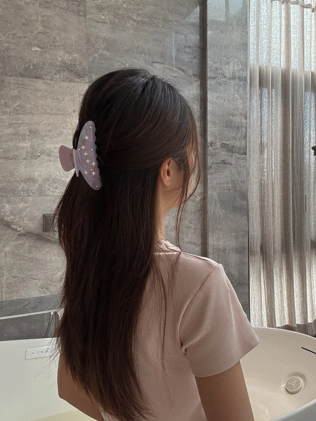 Lifestyle shot – model styling with Big Dipper Hair Claw in Purple, casual chic look