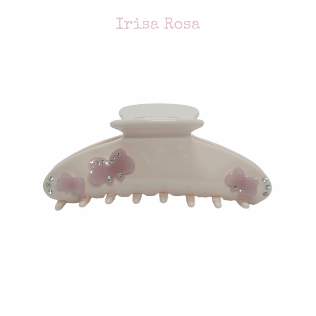 Angled view of Gabrielle Claw in Jade Butter – durable, stylish everyday hair accessory