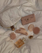 Lifestyle shot of Gabrielle Claw in Jade Butter – chic neutral hair accessory styled with daily essentials