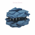 Model wearing Denim Camellia Hair Claw – chic claw clip hair accessory for women