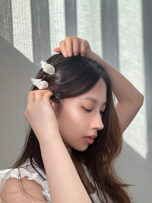 Model styling with Baby Wing clip – chic hair accessory look