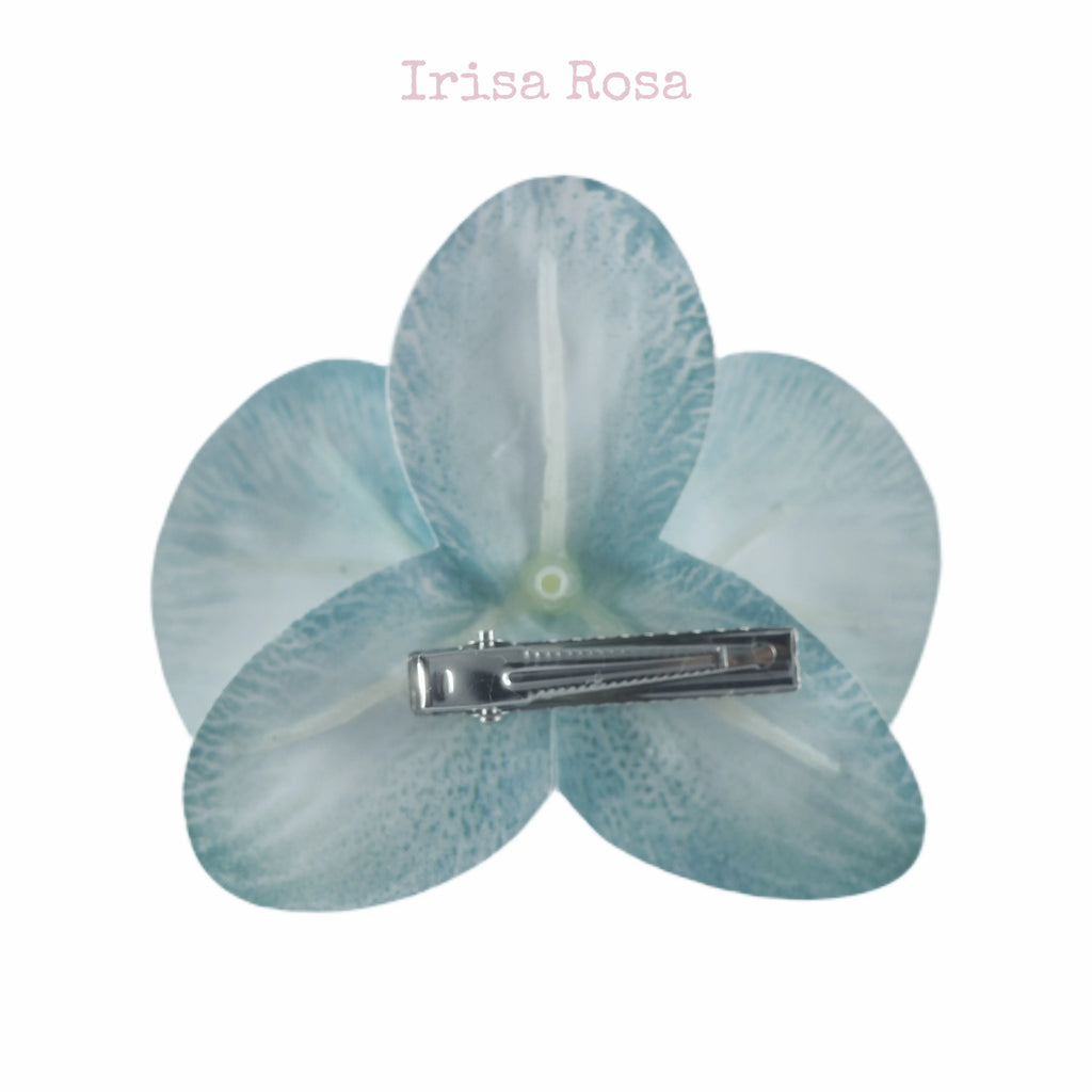 Back view of Baby Blue Orchid Barrette – soft blue orchid hair clip