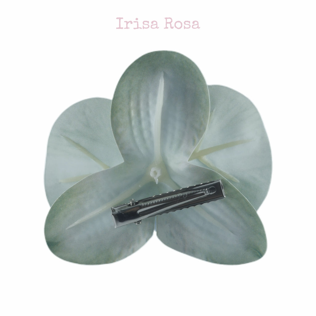 Back view of Mint Orchid Barrette – mint green orchid hair clip
