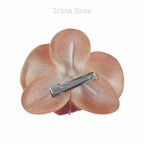 Back view of Sunset Glow Orchid Barrette – secure orchid hair accessory for stylish looks